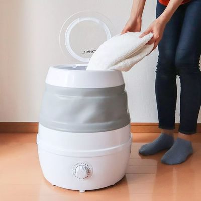 米家折叠洗衣机VS日本品牌 百元级租房神器的技术较量与市场角逐